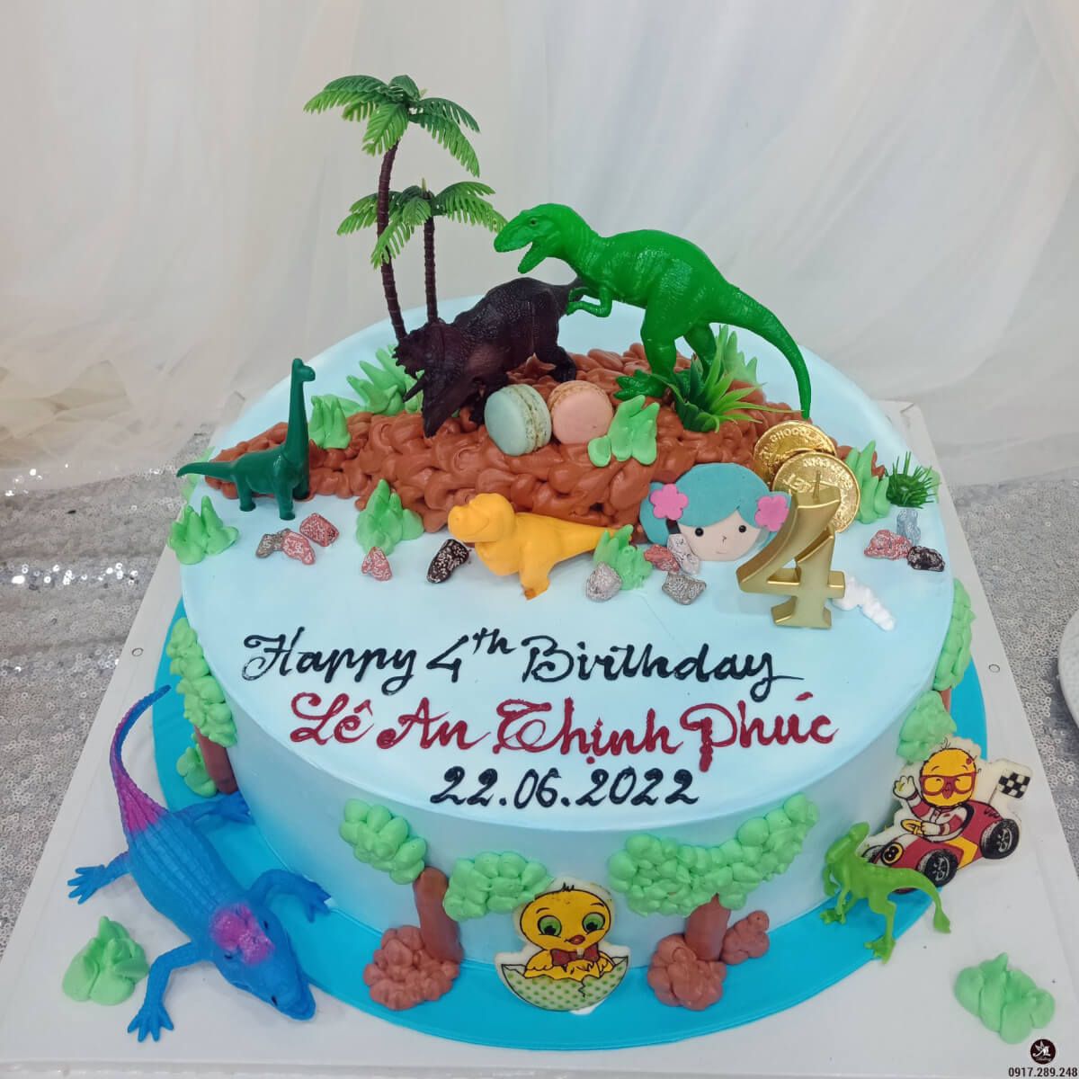 Bánh kem sinh nhật màu xanh hình ảnh những con vật khủng long, hưu ...